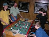 E8700-20041227-DSCN0855  Andy, Mike, Holly and Colin play Foosball : 2004, Andy, Christmas, Colin, Holly, Mike, foosball
