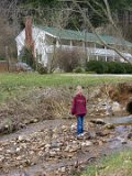 E8700-20041229-DSCN0884  Alison in the creek with Dad's house in background : 2004, Alison, Christmas, house