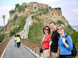 Bridge to Civita  Lois, Teresa, and Hal on the pedestrian bridge going to  the mountain top town of Civita in Italy : 2004, Civita, Hal, Italy, Lois, Teresa, Tuscany