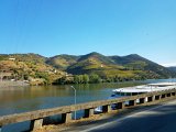 20181010 101851  Régua Dam (Portuguese: Barragem da Régua) is a concrete gravity dam on the Douro, where the river forms the border line between the districts of Vila Real and Viseu. : 2018, Douro Valley, Portugal, _year_