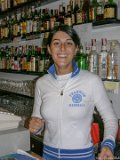 E8700-20041011-DSCN0513  Italy Vernazza barkeep / hotel operator with F&M sweatshirt : 2004, Cinqa Terra, Italy, Vernazza