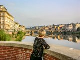 Lois Gazes at Ponte alla Carraia in Firenza  Lois gazes over the Arno River at the Ponte alla Carraia in Florence Italy : 2004, Florence, Italy, Lois