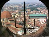 View From Inside the Dome  City view from one of the small oculi in the dome while climbing up Il Doumo in Florence Italy : 2004, Florence, Italy