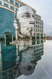 Metalphorosis Study  Metalmorphosis is a mirrored water fountain by Czech sculptor David Černý that was constructed at the Whitehall Technology Park in Charlotte, NC. The 14-ton sculpture is made from massive stainless steel layers that rotate 360 degrees and occasionally align to create a massive head. It even has it’s own live webcam.   3701 Arco Corporate Dr Charlotte, NC 28273 : Big Head, Charlotte, Metalmorphosis
