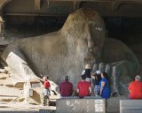 ILCE-6500-20180512-DSC01911  Freemont statues The Freemont Troll (The Troll Uner The Bridge) Built in 1989, conceived as a way to revitalize the area under the Aurora Bridge, which had fallen derelict to the use of drug dealers. The street right in front of was renamed Troll Avenue in 2005. Depicts a large troll holding tightly onto a real Volkswagen Beetle.  Designed by four local artists. : 2018, Freemont, Seattle, The Freemont Troll, The Troll Under The Bridge