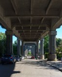 ILCE-6500-20180512-DSC01921  Freemont statues The Freemont Troll (The Troll Uner The Bridge) Built in 1989, conceived as a way to revitalize the area under the Aurora Bridge, which had fallen derelict to the use of drug dealers. The street right in front of was renamed Troll Avenue in 2005. Depicts a large troll holding tightly onto a real Volkswagen Beetle.  Designed by four local artists. : 2018, Freemont, Seattle, The Freemont Troll, The Troll Under The Bridge, buildings & architecture